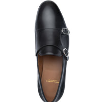 Top view of Superglamourous Odilin black nappa leather double monk strap loafer, featuring two silver-tone buckles, a smooth rounded toe and a brown leather interior. | Image 4