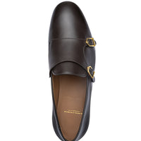 A dark brown leather double strap loafer with gold-tone buckle hardware, shown from a top-down view on a white background. | Image 4