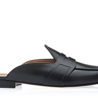 A single black leather penny loafer mule with a low block heel, shown in profile against a clean white background. | Image 3